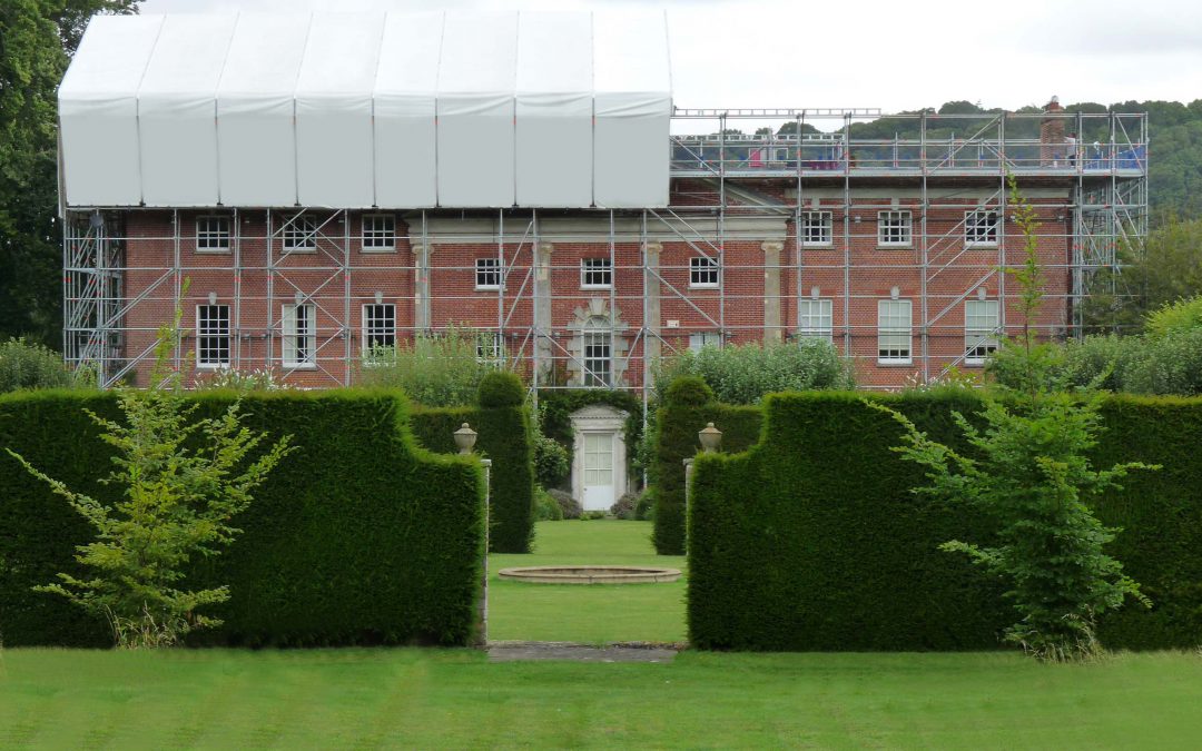 Listed building covers up with Layher