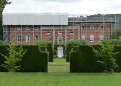 Listed building covers up with Layher
