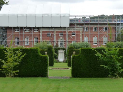 Listed building covers up with Layher